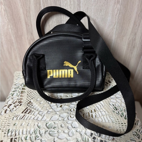 Puma Handbags - PUMA Core Up Mini Grip Bag with Gold Logo Crossbody